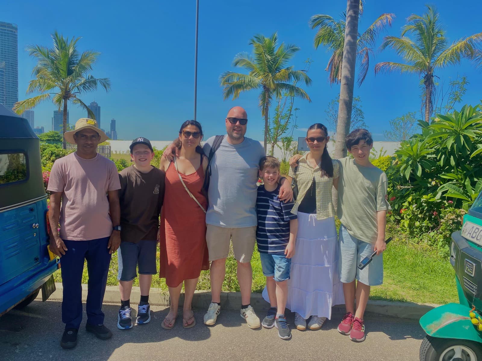 Family group with David's tuk-tuks at Galle Face