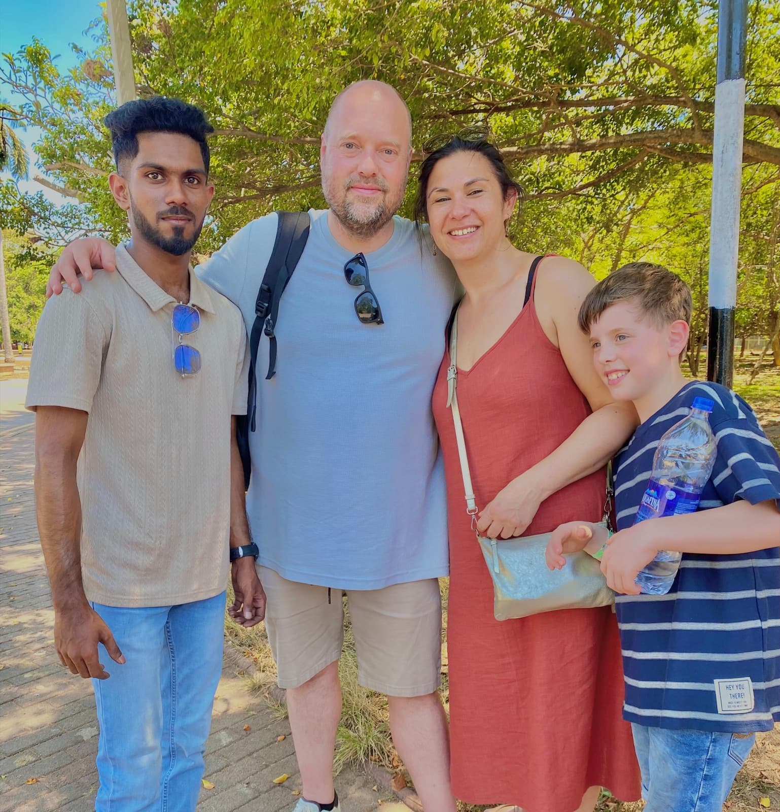 Family portrait under shady trees on a Colombo tour
