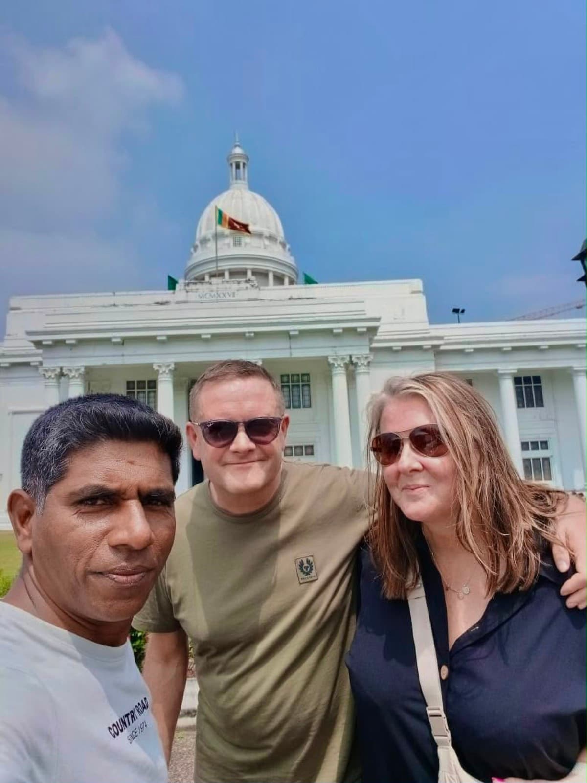 David's selfie with a couple in front of Colombo Town Hall